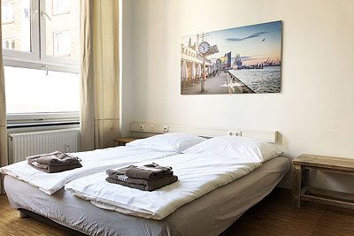 Ferienwohnung onBoard: Wohnzimmer Schlafcouch 2 ausgezogen