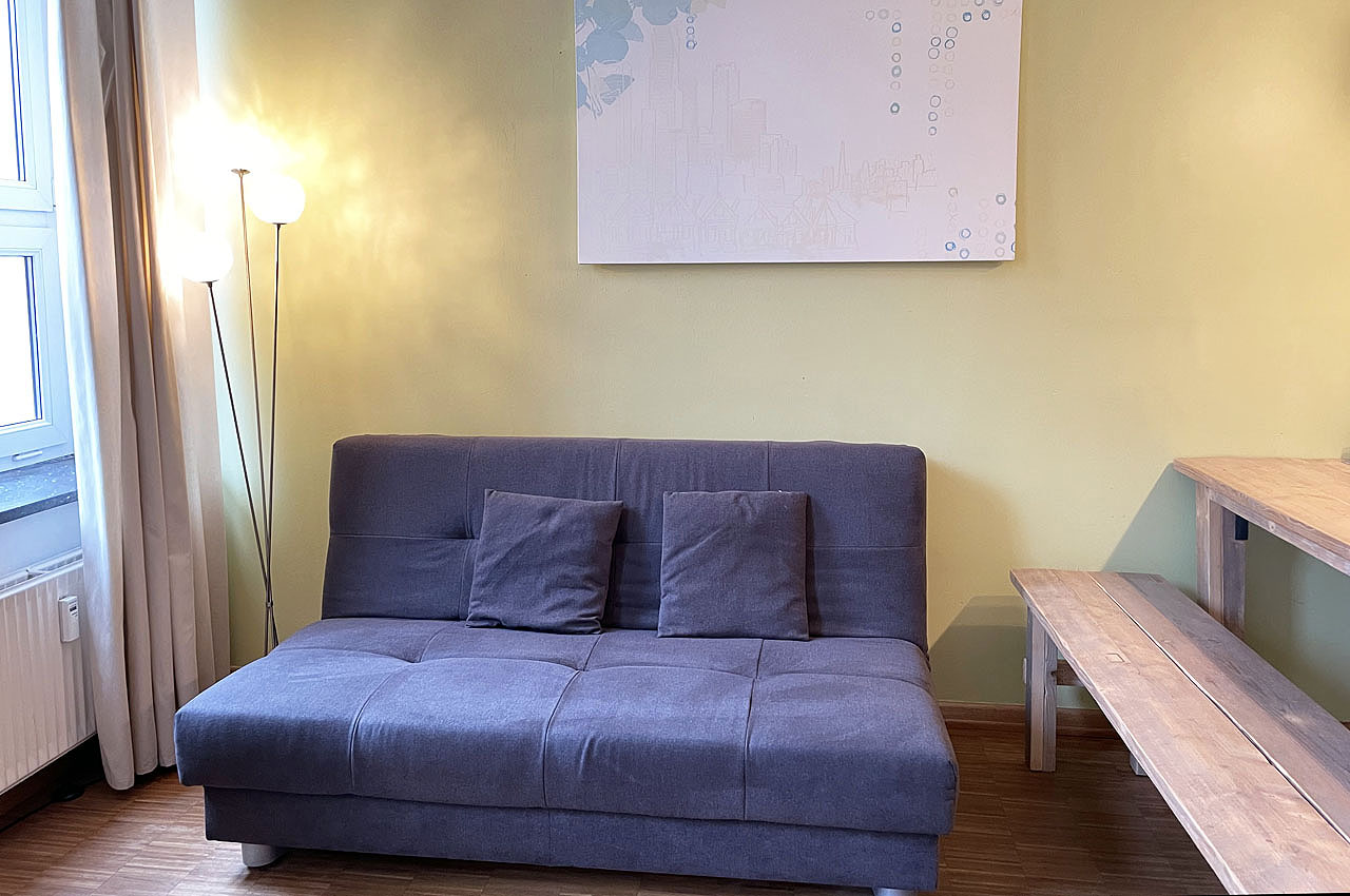 Ferienwohnung Style: Wohnzimmer Schlafcouch