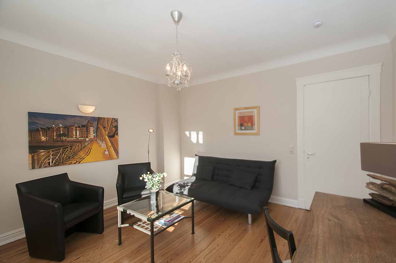 appartement ml7 wohnbereich sessel couch fernseher